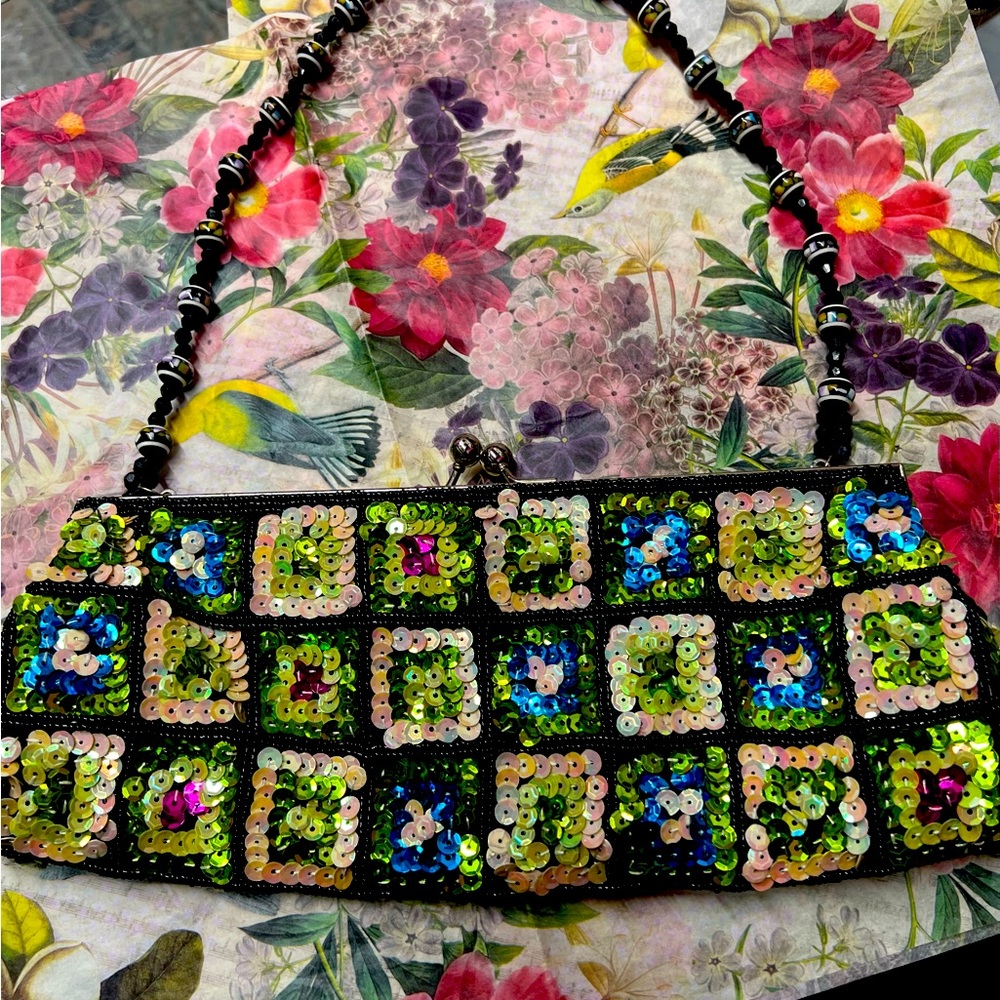 Cato clutch handbag